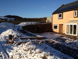 Dry stone retaining walls and recess arch