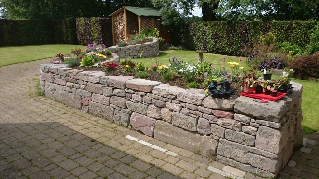 Stone Inspired Stone raised beds - Stone Inspired