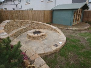 Dry stone bench and firepit