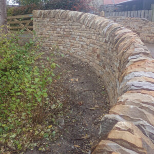 Curved drystone wall