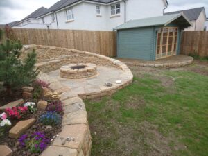 Rosewell garden stone seating area and firepit