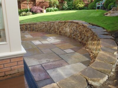 Livingston back garden patio and dry stone retaining wall