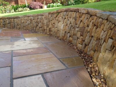 Livingston back garden patio and dry stone retaining wall