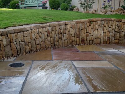 Livingston back garden patio and dry stone retaining wall