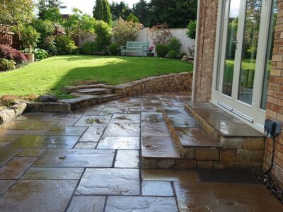 Livingston back garden patio and dry stone retaining wall